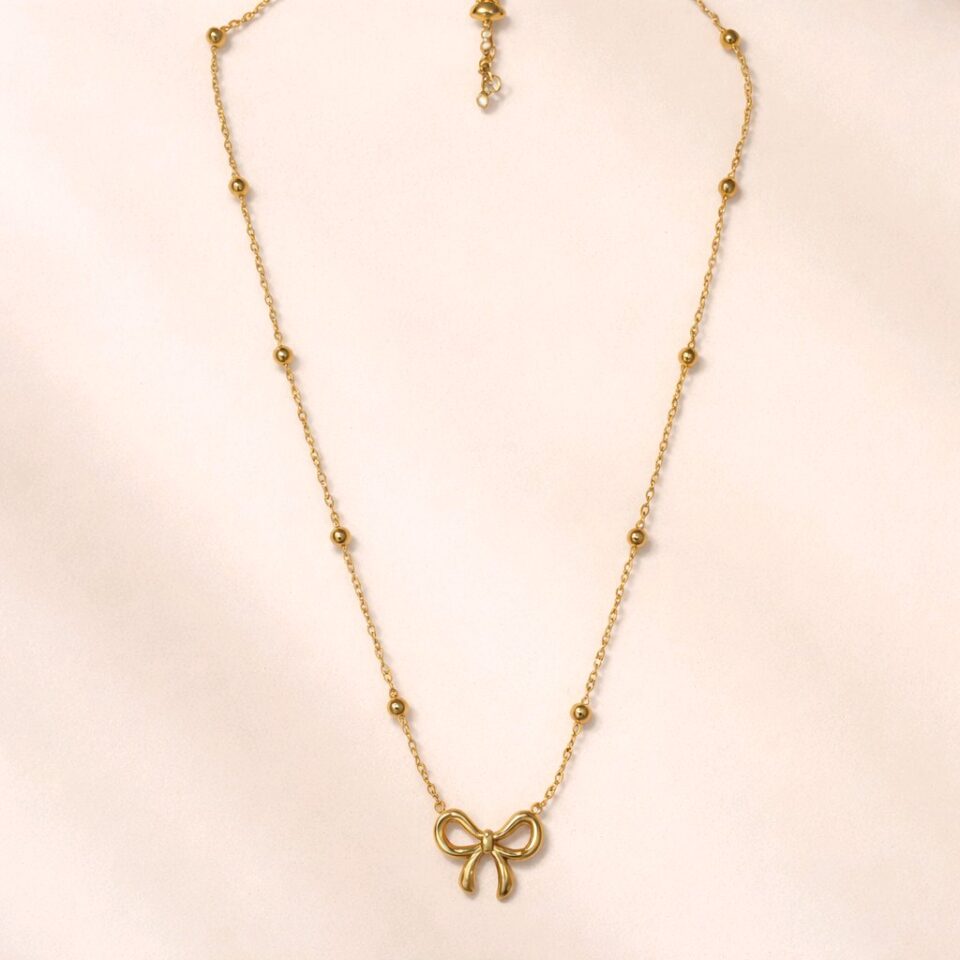 Set collar, pulsera y aretes de moño